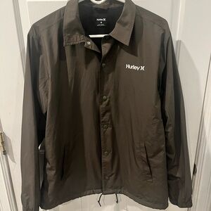 This is a Hurley Siege Coaches Jacket olive green color size medium.